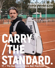 Patrick Mouratoglou carrying the Nisplay Y1 portable tennis ball machine